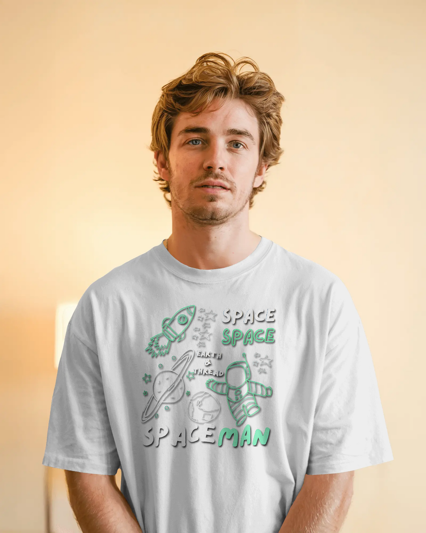 Explore the Cosmos in Oversized Comfort – Spaceman Tee